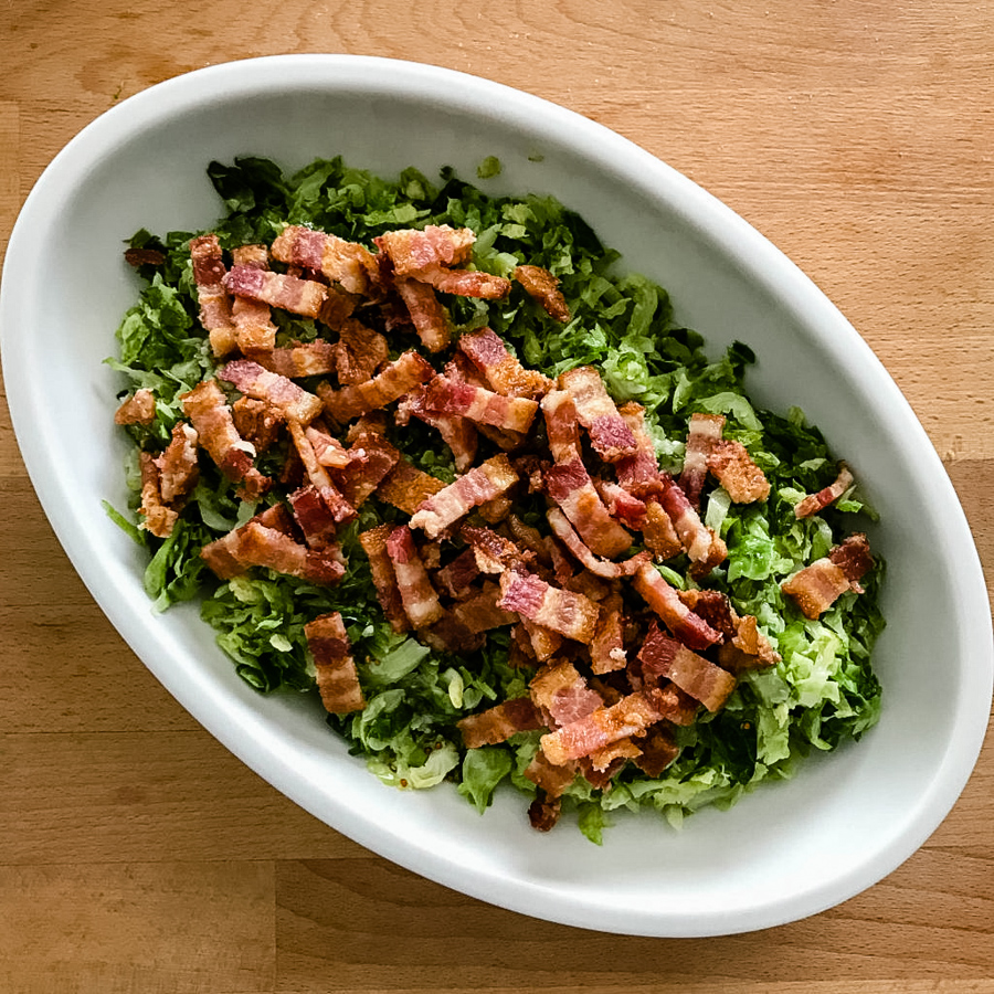 Brussels sprouts side dish with bacon on top