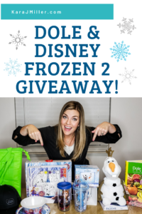 A woman excitedly pointing to Dole and Disney Frozen 2 swag