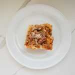 slice of french toast casserole on white dish