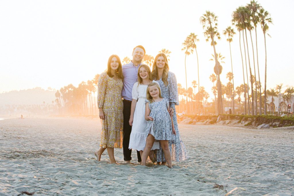 kara j miller author and family on beach in california
